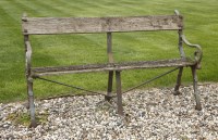 Lot 952 - A cast iron garden bench