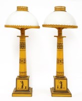 Lot 1187 - A pair of toleware table lamps