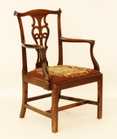 Lot 699 - A Chippendale style mahogany elbow chair