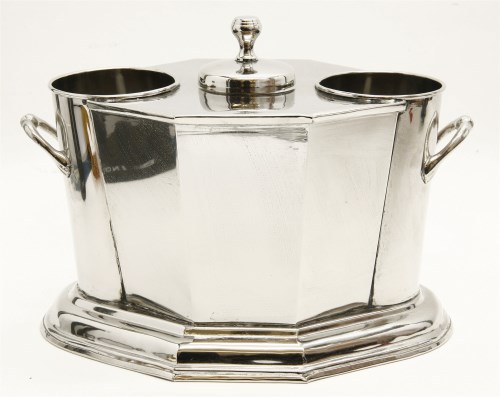Lot 440 - A chrome plated bottle coaster