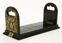 Lot 222 - A coromandel and brass mounted book slide