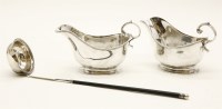Lot 137 - A pair of Asprey silver sauce boats