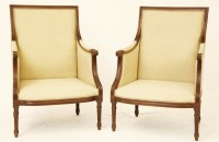Lot 608 - A pair of Regency style mahogany and yellow upholstered arm chairs