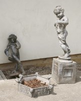 Lot 1105 - Two lead garden statues