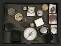 Lot 56 - A collection of compasses