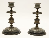 Lot 142 - A pair of Doulton Lambeth Art Nouveau stone ware and brass candlesticks