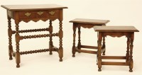 Lot 717 - A 17th century style walnut single drawer table with ribbon turned base
