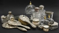Lot 79 - A collection of silver topped dressing table items