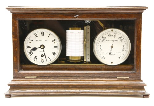 Combi Clock Lot 311 - An early 20th century oak cased combination