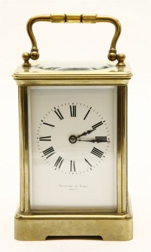 Lot 161 - A French lacquered brass and fire glass carriage clock