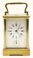 Lot 161 - A 20th century French brass and fire glass carriage alarm clock