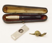 Lot 65 - A Dunhill 9ct gold mounted
