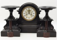 Lot 313 - A late Victorian black slate mantel clock
