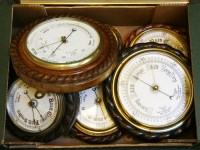 Lot 336 - Seven various oak and walnut cased 'rope twist' aneroid barometers
