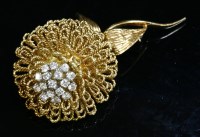 Lot 239 - A 14ct gold diamond set chrysanthemum brooch