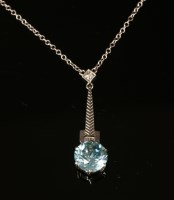 Lot 172 - A white gold Art Deco blue zircon and diamond pendant