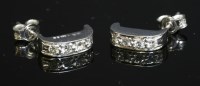 Lot 438 - A pair of 18ct white gold flat section ear cuffs
