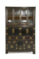 Lot 641 - A large black lacquered Chinese cabinet