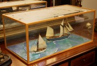 Lot 457 - A diorama of sailing vessels afloat