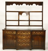 Lot 626 - A George III oak dresser