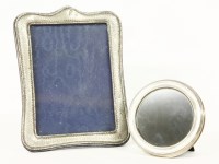 Lot 120 - Two silver mounted photograph frames

Provenance:  The Estate of the late Mrs Annabelle Comery