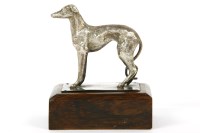 Lot 145 - A silver model of a standing greyhound
