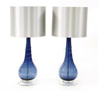 Lot 512 - A pair of William Yeoward blue glass and clear spiral table lamp bases
