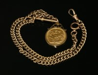 Lot 499 - A 9ct gold curb link double albert