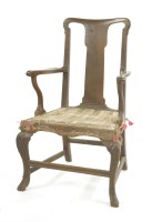 Lot 1077 - A George II walnut elbow chair