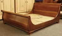 Lot 712 - A king size mahogany sleigh bed