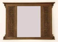 Lot 747 - An Arts and Crafts oak overmantel mirror