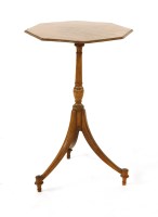 Lot 1064 - A satinwood tripod lamp table