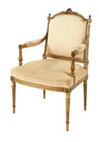 Lot 1071 - A Louis XVI-style elbow chair