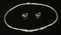 Lot 437 - A two colour gold diamond set necklace and earring suite