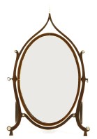 Lot 549 - A strung mahogany George III style oval dressing mirror