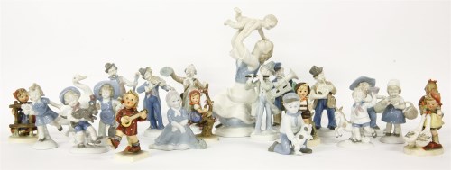 Lot 240 - A collection of Continental porcelain figures