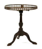Lot 573 - A reproduction mahogany tripod table