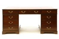 Lot 594 - A reproduction mahogany twin pedestal desk