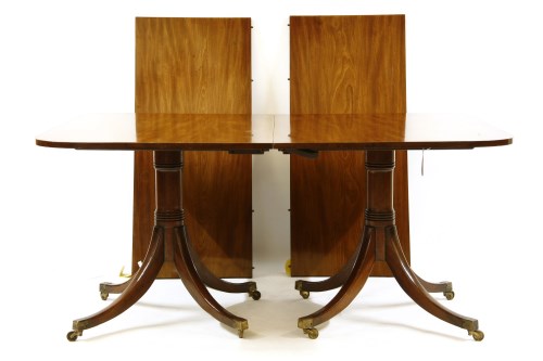 Lot 663 - A good reproduction mahogany twin pedestal dining table