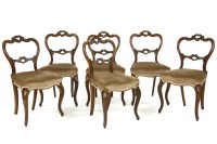 Lot 602 - A set of six Victorian walnut single dining chairs