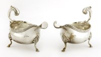 Lot 253 - A pair of George III sauce boats
