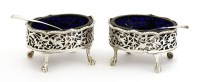 Lot 254 - A pair of George III oval silver salts