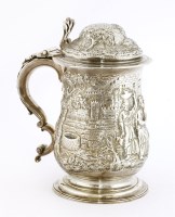 Lot 264 - A George II silver tankard and cover