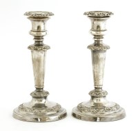 Lot 298 - A pair of George III silver candlesticks