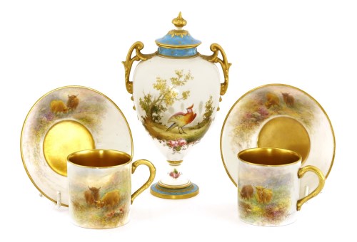 Lot 379 - A pair of Royal Worcester cups and saucers