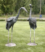 Lot 557 - Two Japanese bronze models of cranes