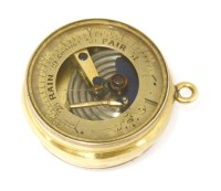 Lot 31 - An 18ct gold pocket barometer and compass