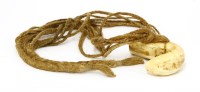 Lot 470 - A whale tooth necklace