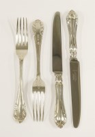 Lot 322 - A set of twelve pairs of silver table knives and forks