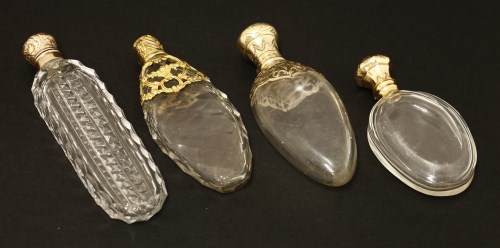 Lot 101 - Four clear glass scent bottles